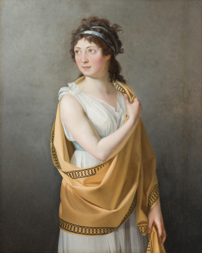 A woman with very light skin, pink cheeks, and dark brown curly hair stands with one arm across her chest and looking away to her right. She is wearing a pale blue dress that ties at the shoulders, and is gripping a yellow wrap or shawl that is draped over one shoulder and around her waist.