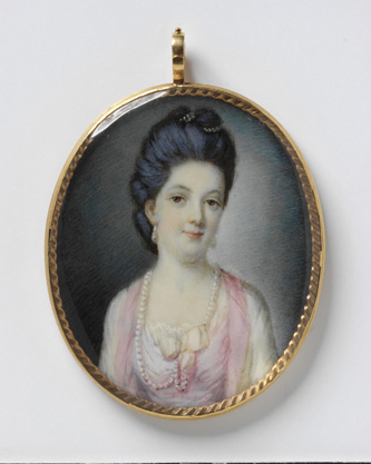 A woman with very light skin and an dark hair swept into an updo looks directly out at the viewer. She wears pearl earrings and a long pearl necklace, along with a pale pink dress with an ivory-colored bow. The painting is an oval shape and at the top it has a loop for a chain to attach to the portrait.