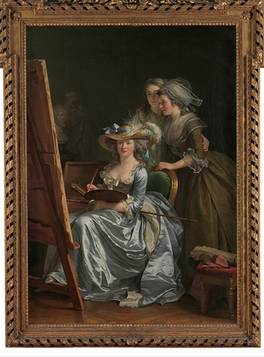 A light-skinned woman in a blue dress with a large feathered hat is seated at an easel, holding a paint palette and looking directly at the viewer. Behind her, two younger women, both with light skin and dressed in muted colors, look over the back of her chair at what the seated woman is painting.
