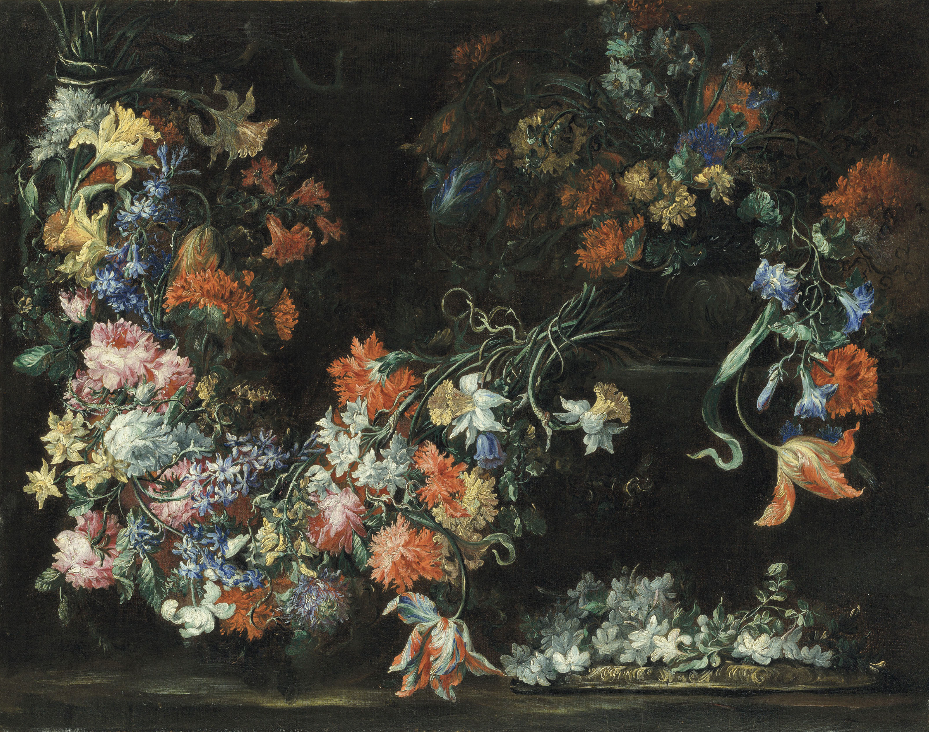 An elaborate floral still life with multiple arrangements of flowers in every color filling the entire composition. The background is dark and there are clusters of delicate, white flowers sitting on the table in the bottom right corner of the composition. 