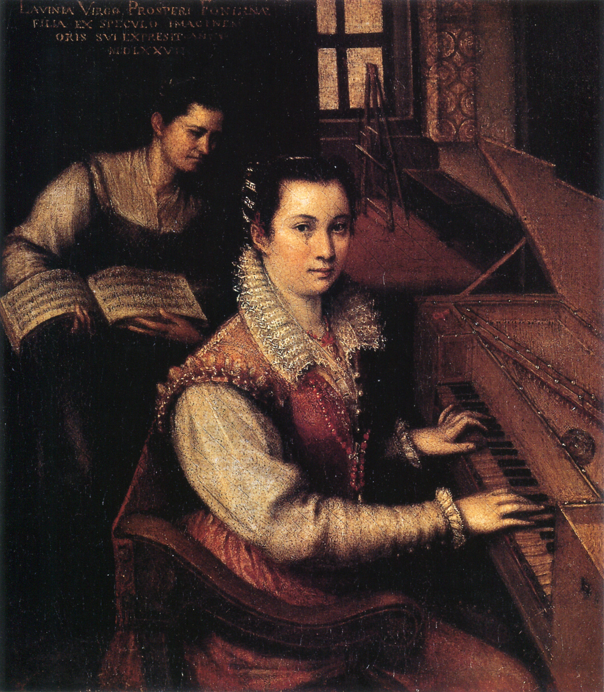 The artist sits at a clavichord, shown at half-length and turned so her right side is visible. She looks out directly at the viewer. Behind her, another woman brings her sheet music. In the background, the room is furnished with a bench, a window, and an empty easel. An inscription at the top left corner of the painting identifies the artist.