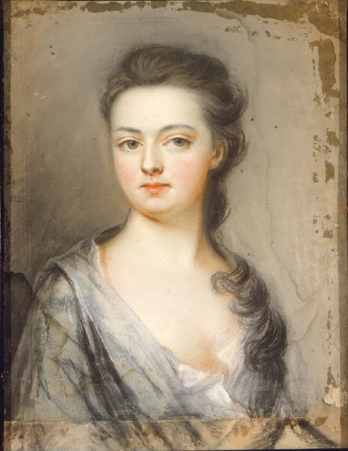 A bust-length portrait of a young woman, whose curly hair is pulled back and around to one side. She wears a light blue gown and looks out serenely at the viewer.
