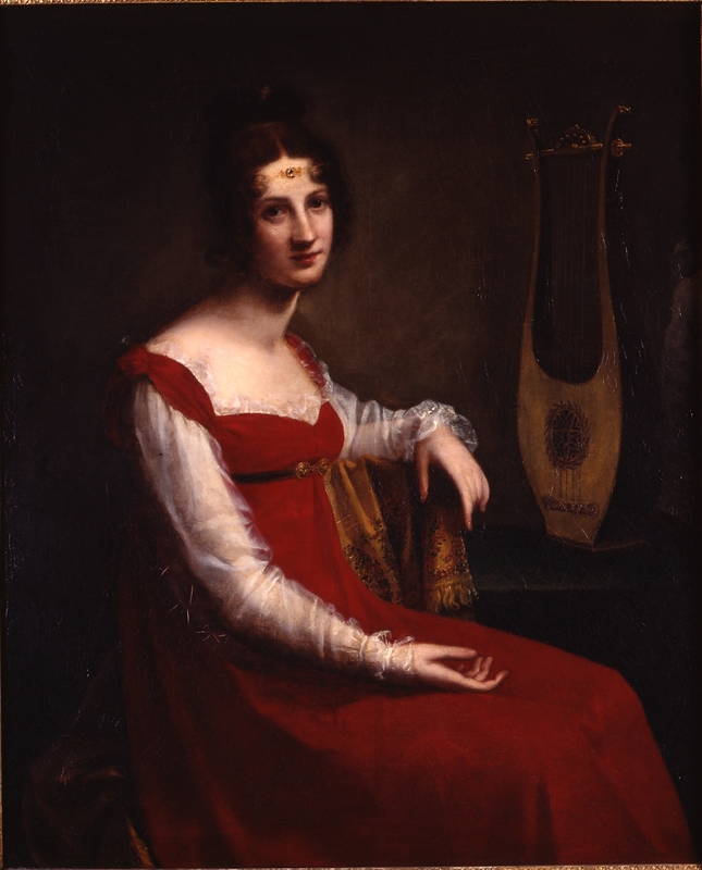 A near full-length portrait of a woman, seated in a red gown with a diaphanous white chemise. She rests her left elbow on the back of the chair behind her and looks out at the viewer with a neutral expression. Her hair is pulled back, and she wears an embellished chair across her forehead. A lyre sits upright on the table behind her. 