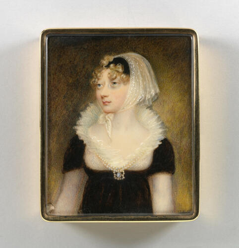 A rectangular portrait miniature of a young woman wearing a black dress with a white lace collar and a white veil attached to a black headband. She wears a pearl necklace with a jeweled pendant. The portrait is half-length, in front of a neutral brown background, and she looks off to the left.
