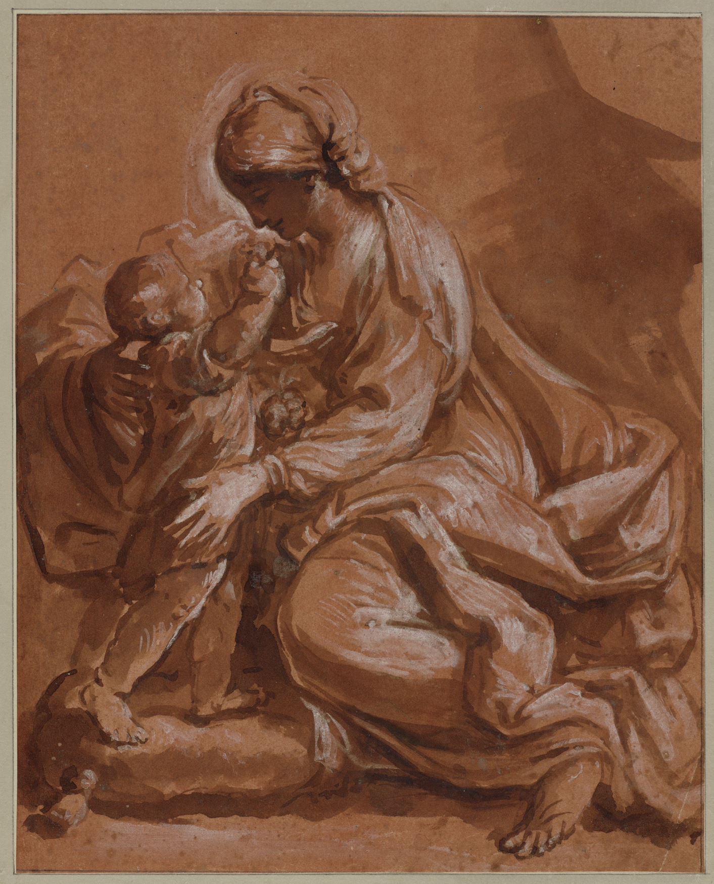 A brown ink drawing on terracotta colored paper with white heightening, the image of the Virgin Mary and Jesus, who appears to be two years old. He stands on a rock to reach up to her, showing her something in his right hand. She embraces him with both arms and looks down at him with motherly love and devotion.