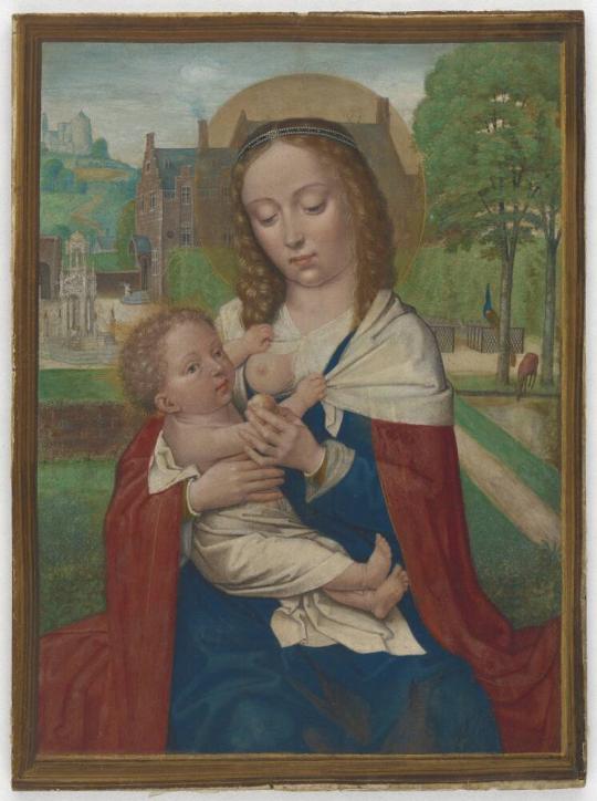 The Virgin Mary, dressed in blue and red robes and crowned with a halo, is seated holding the infant Jesus, who is wrapped in white cloth. The Infant is pulling the robes away to expose Mary’s bare breast, while she looks down at him. They are seated in a park in a fifteenth-century Dutch city.